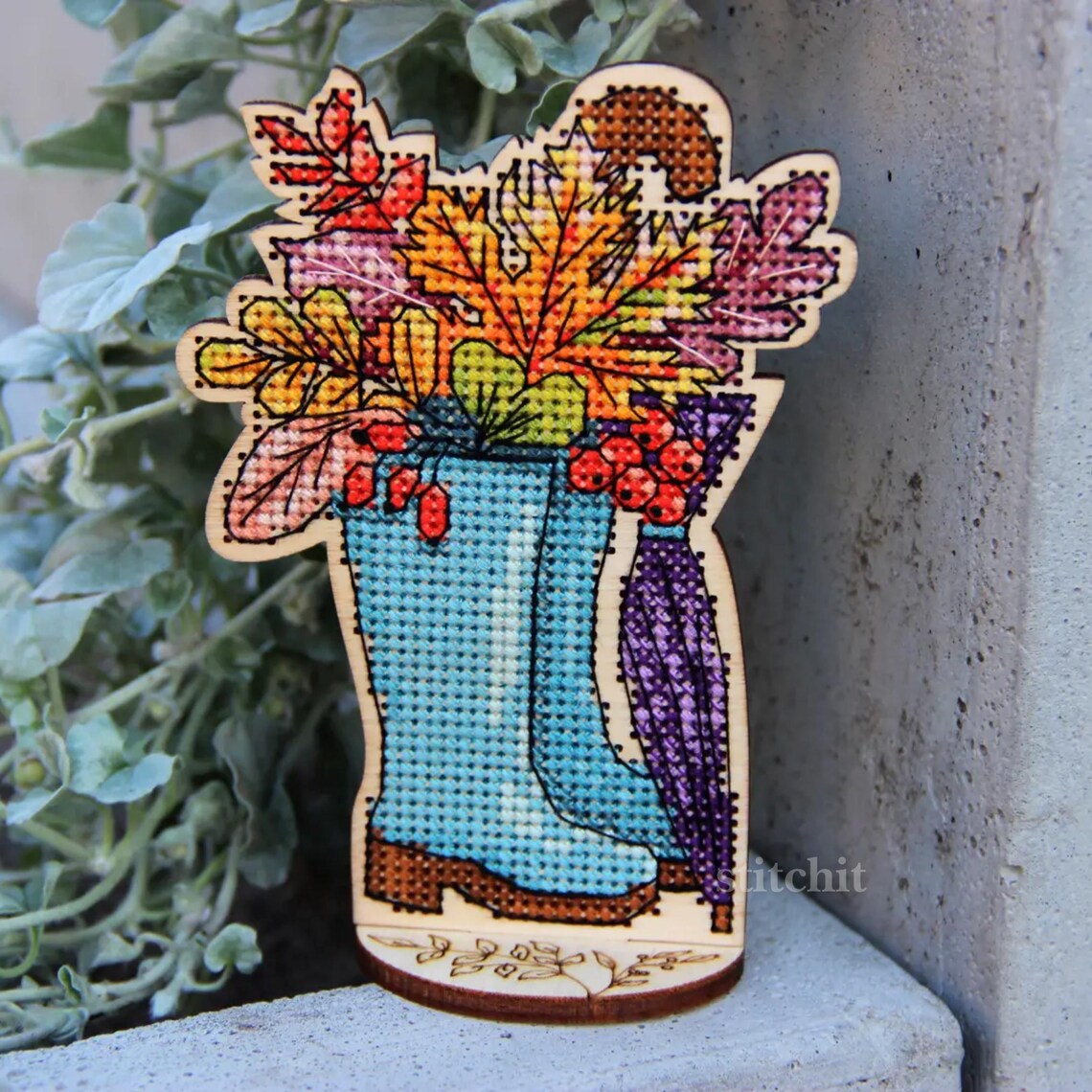 Beginner Embroidery Kit On Wood | Autumn Boots Cross Stitch | Product Preview In A Garden