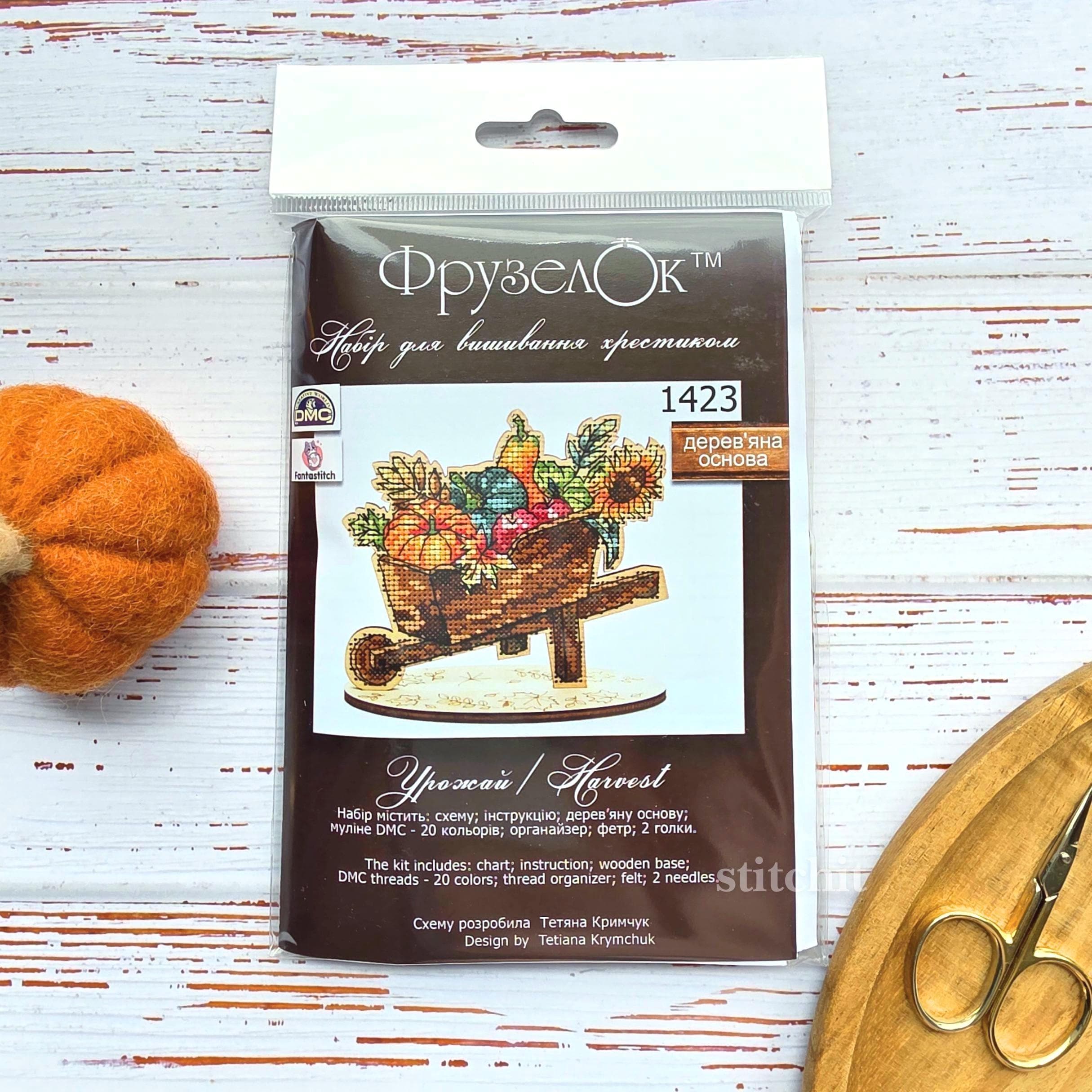Harvest Cross Stitch Kit on Wood packaging with autumn-themed design and wooden base.