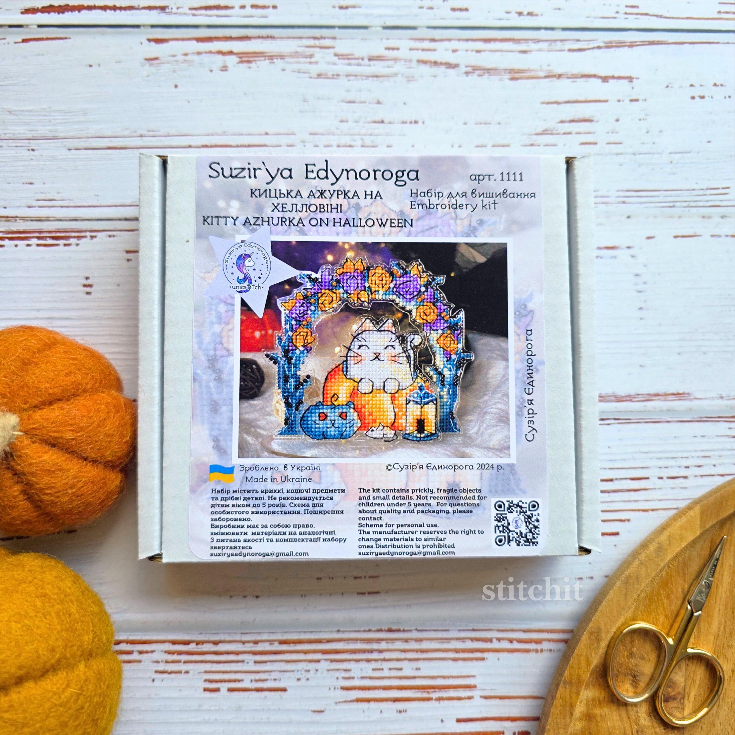 Cat pumpkin cross stitch kit packaging featuring a cute cat and Halloween lanterns, perfect for embroidery enthusiasts.